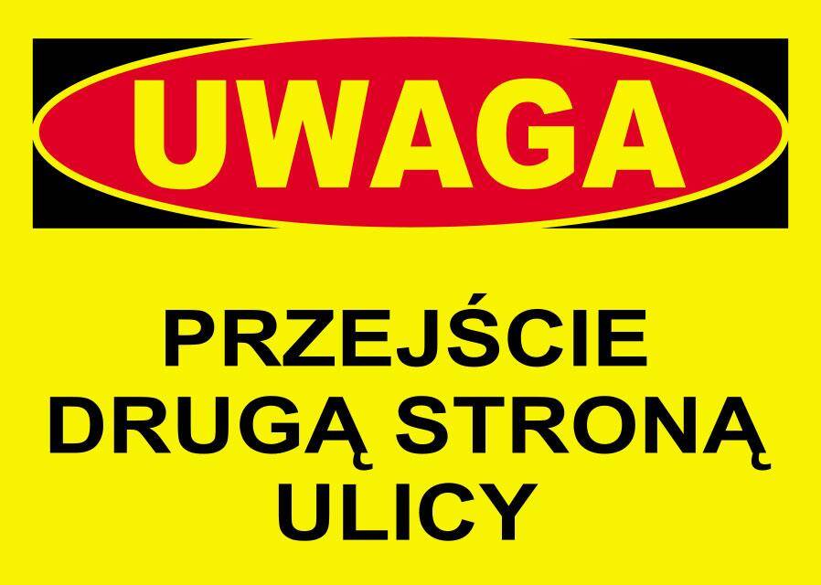 Tablica UWAGA - przejście drugą stroną ulicy